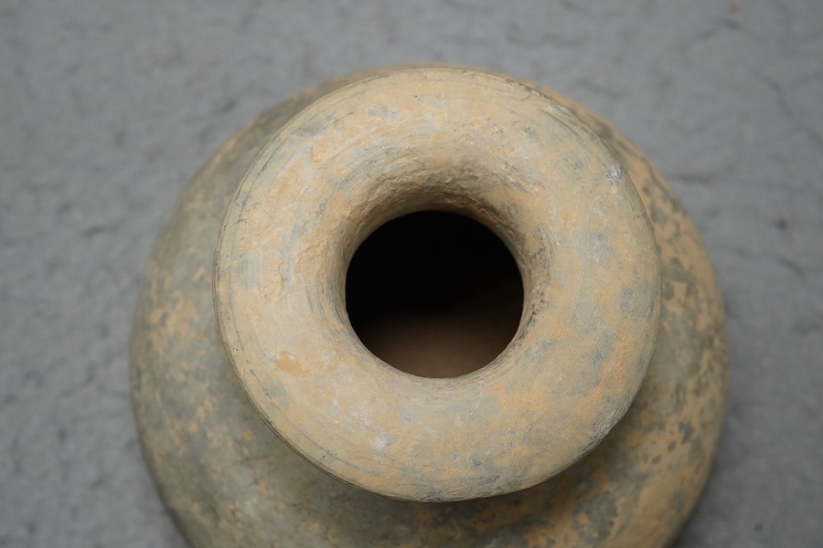 Four very rare Chinese inscribed pottery jars, Han dynasty